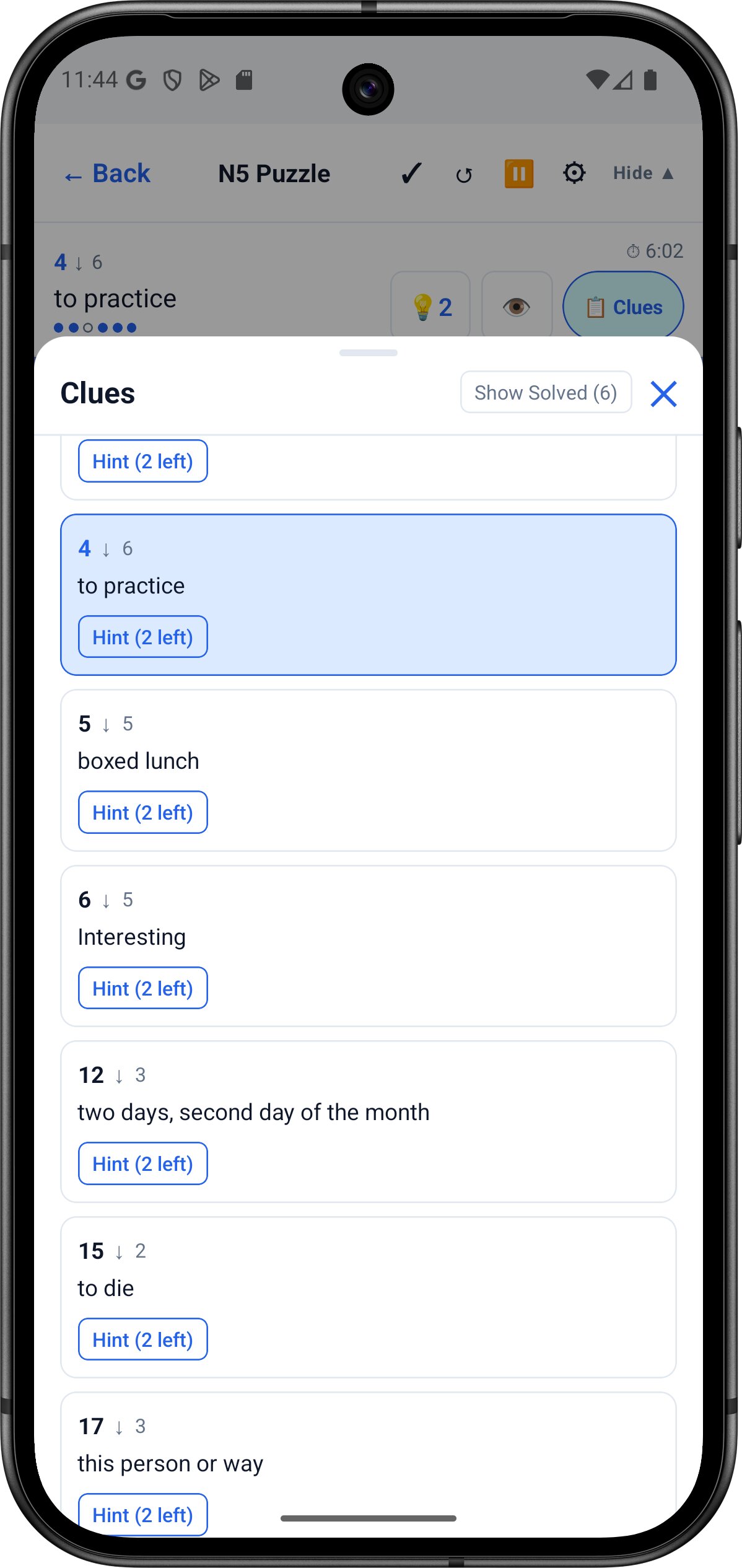 Clue browser panel listing all across and down clues for the current JLPT puzzle