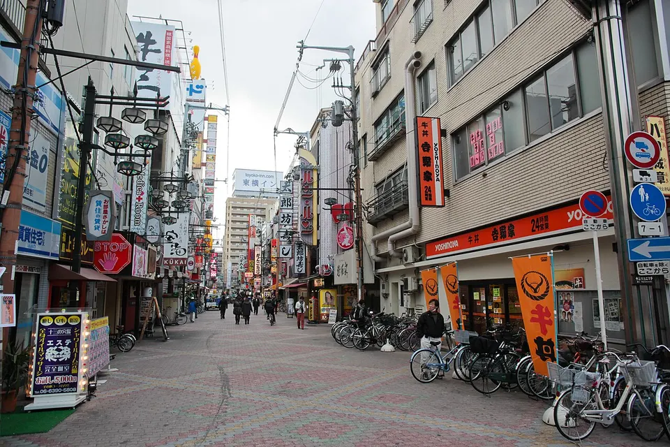 Narrow street with small bars and restaurants in Juso, Osaka